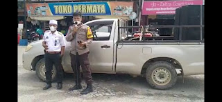 Menggunakan Pengeras Suara, Polsek Masamba Kota Gencar Ajak Warga Untuk Vaksin