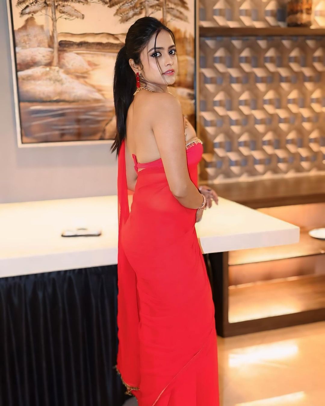 Pragya Nayan Back pose in Red Transparent Saree