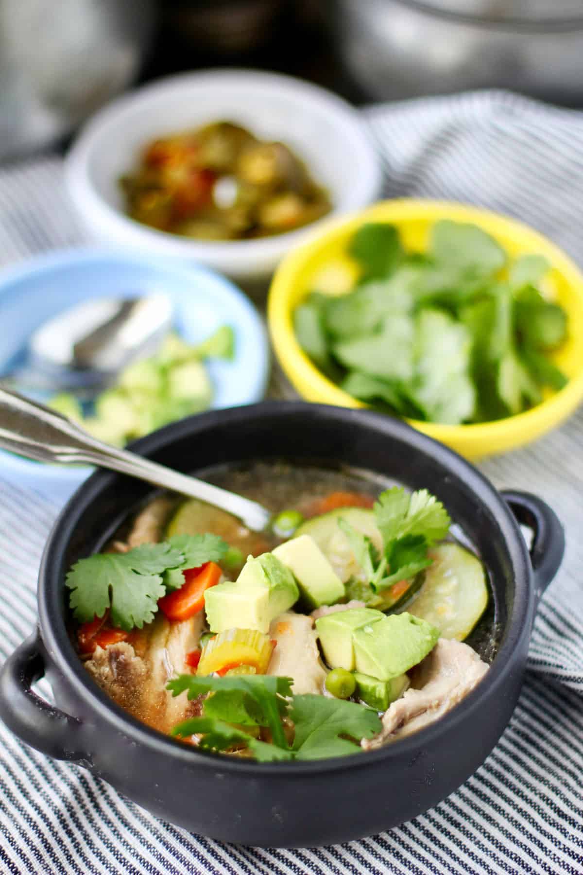 Mexican-Style Chicken Soup in bowls.