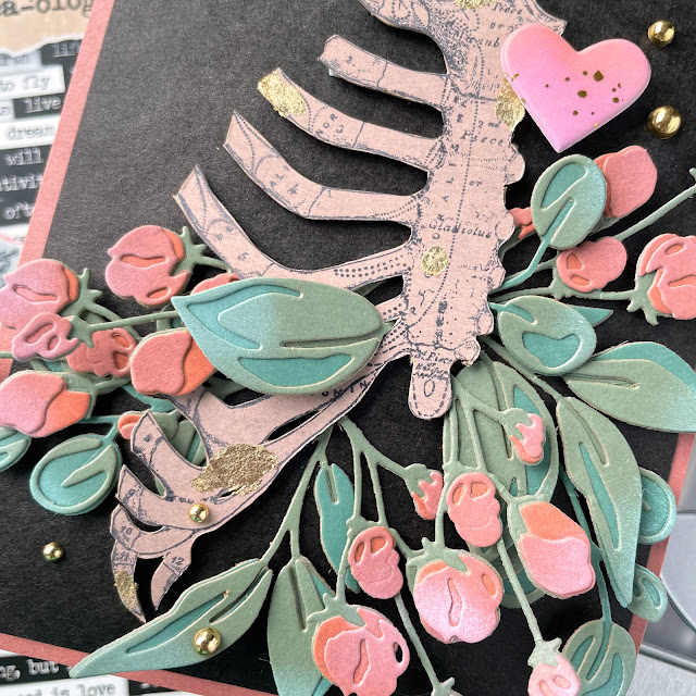 Valentine's Day card made with: Tim Holtz anatomy chart stamp, bloom colorize die, kraft stock, distress oxide in kitsch flamingo and cracked pistachio, small talk stickers; Pinkfresh puffy heart stickers, gold pearls