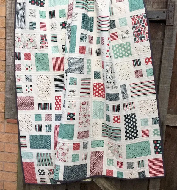 quilt with multiple sized squares