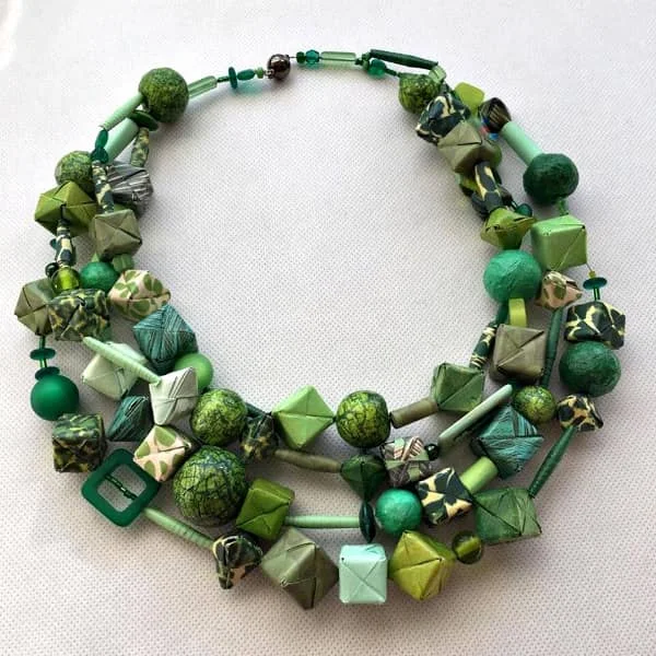 handmade triple layer chunky necklace in shades of green featuring origami paper cubes and rolled paper beads