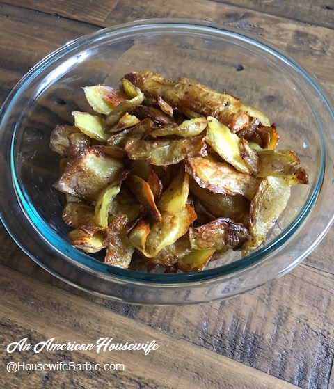 Bowl of crispty baked potato peels - using up potato peelings