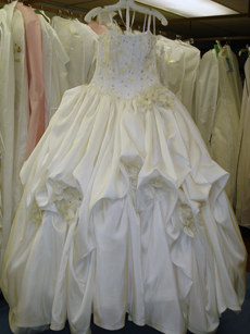 Amelia Casablanca Wedding Gown cleaned at Janet Davis Cleaners before and after cleaning