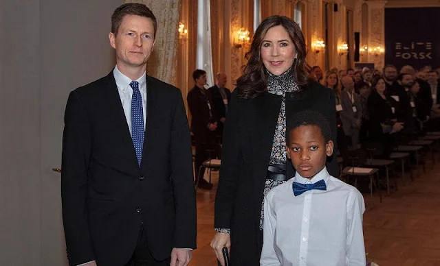 Crown Princess Mary wore a beige floral print mock neck smocked cuff blouse shirt top. Anne Ladegaard Skov