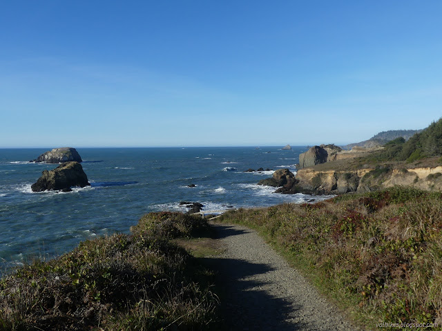 11: trail and vertical rocks to the water