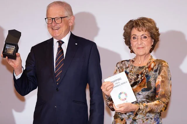 Princess Margriet and Pieter van Vollenhoven visited University of Twente. Floral print dress