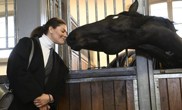 Crown Princess Victoria wore a black Annecy jacket by Toteme, and white Polana cashmere knit sweater by Andiata. Valentino boots