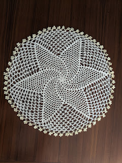 Full view of the delicate Pinwheel Doily - a free crochet pattern from Sweet Nothings Crochet