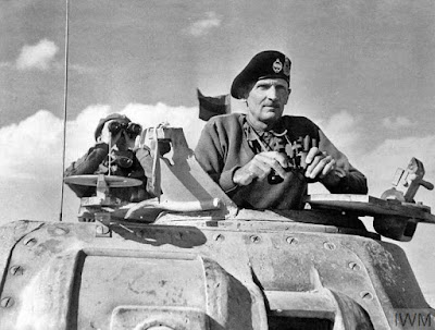 Gen. Montgomery with beret on tank.