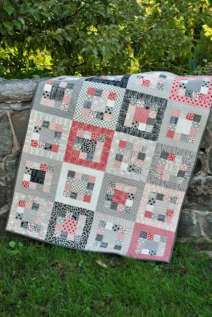 patchwork quilt using jelly roll fabric