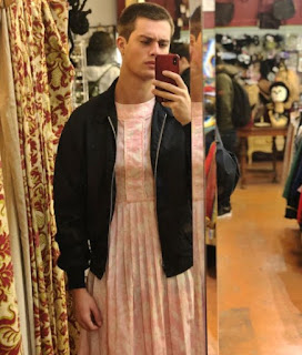 Nicholas Galitzine clicking selfie wearing female dress