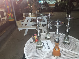 " Hookah " smokes at classic " Shoestrings Backpackers Lodge "