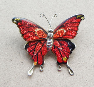 Orange glitter butterfly brooch 1960s