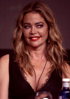 denise richards hot, sleeve-less black outfit, how she is looking in 2021