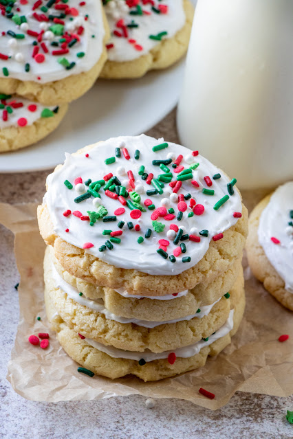 Stack of frosted christmas sugar cookies.