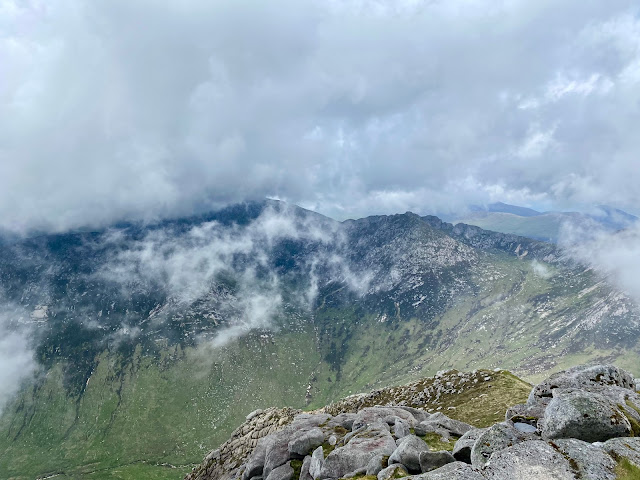 Views of mountains in the clouds from Goat Fell, Isle of Arran, Scotland
