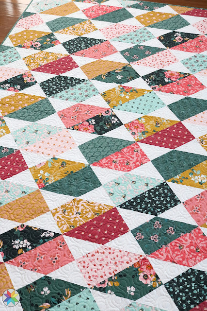 Plot Twist quilt pattern by Andy Knowlton of A Bright Corner a modern layer cake and fat quarter quilt pattern with five sizes