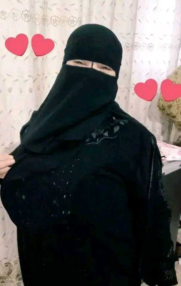 Muslim Girl in Black Hijab with Hearts 