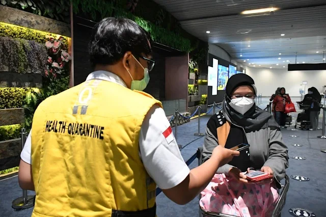 Cover Image Attribute: Indonesian officials ensure strict screening upon arrival/ Source: Indonesia's Ministry of Health (Kementerian Kesehatan)