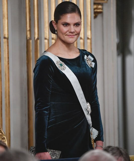 Crown Princess Victoria wore a wanderlust coat from Unreal Fur, and green gown. King Carl Gustaf and Queen Silvia
