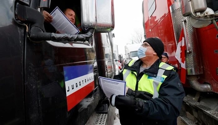 'Getaway, or be arrested' CANADA 'police threat to truck drivers