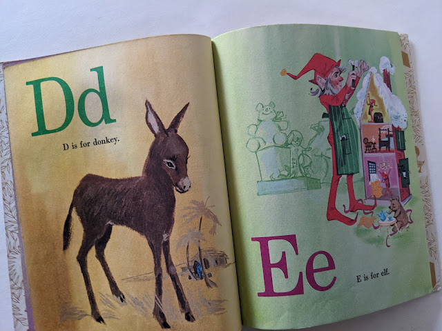 picture of children's book pages with illustration of a donkey