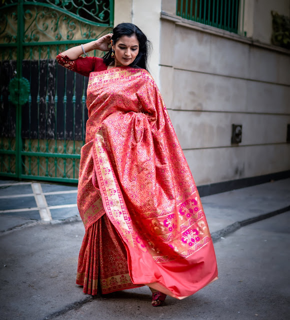 Banarasi silk saree with Patola style body and paithani style border and pallu.