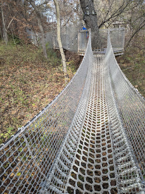 a rope bridge at the Arbor Day Farm Treetop Adventure in Nebraska