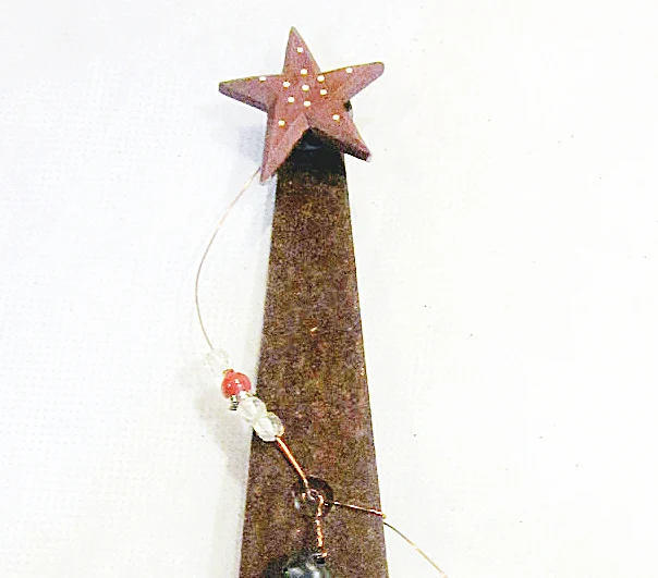 star on top of rusty hinge