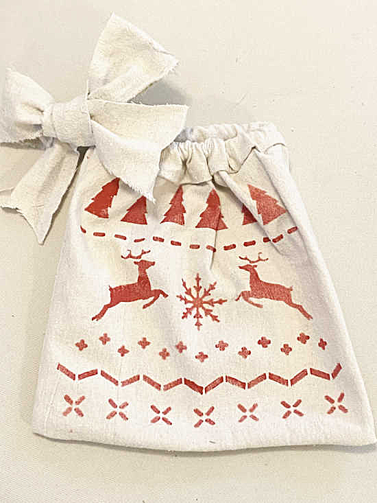drop cloth bow on gift bag