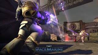 A malign Chaos Space Marine in bone colored, corrupted power armor charging a multihued group of his armored brethren, as they fight with a giant crane overhead, in front of a concrete structure adorned with the bronze symbol of the mechanicus: a half-skull, half machine emblem enclosed by a cog.