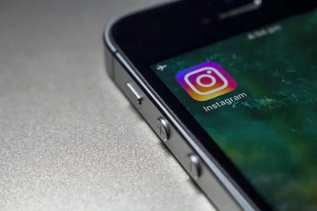 iPhone with instagram icon on display