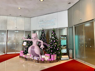 The Pokémon Mewtwo greets guests at the hotel entrance