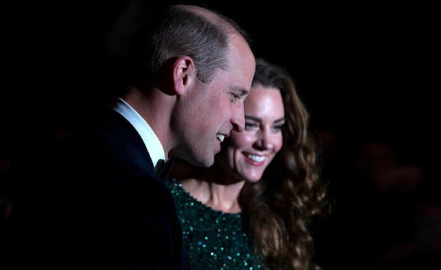 Kate Middleton wore a green gown by Jenny Packham. ​Emmy London pumps and Missoma London earrings