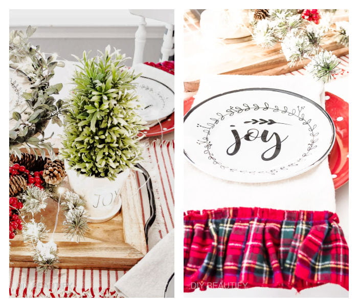 Christmas table with greenery, red plates, plaid edged napkins