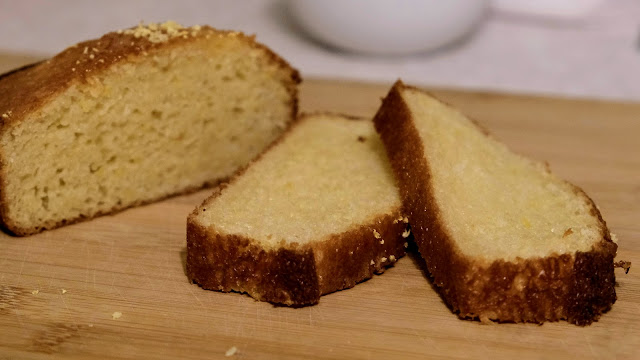 Slices of Vegan Lemon Drizzle Cake on a chopping board