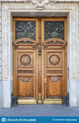Double door with recessed square carvings