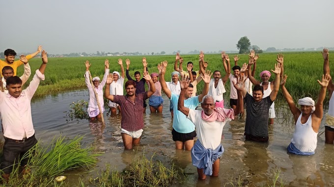 चन्दौली: हेतमपुर ताल में ड्रेन की सफाई को लेकर किसानों का प्रदर्शन