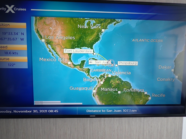 A television screen showing a navigation map for the ship.