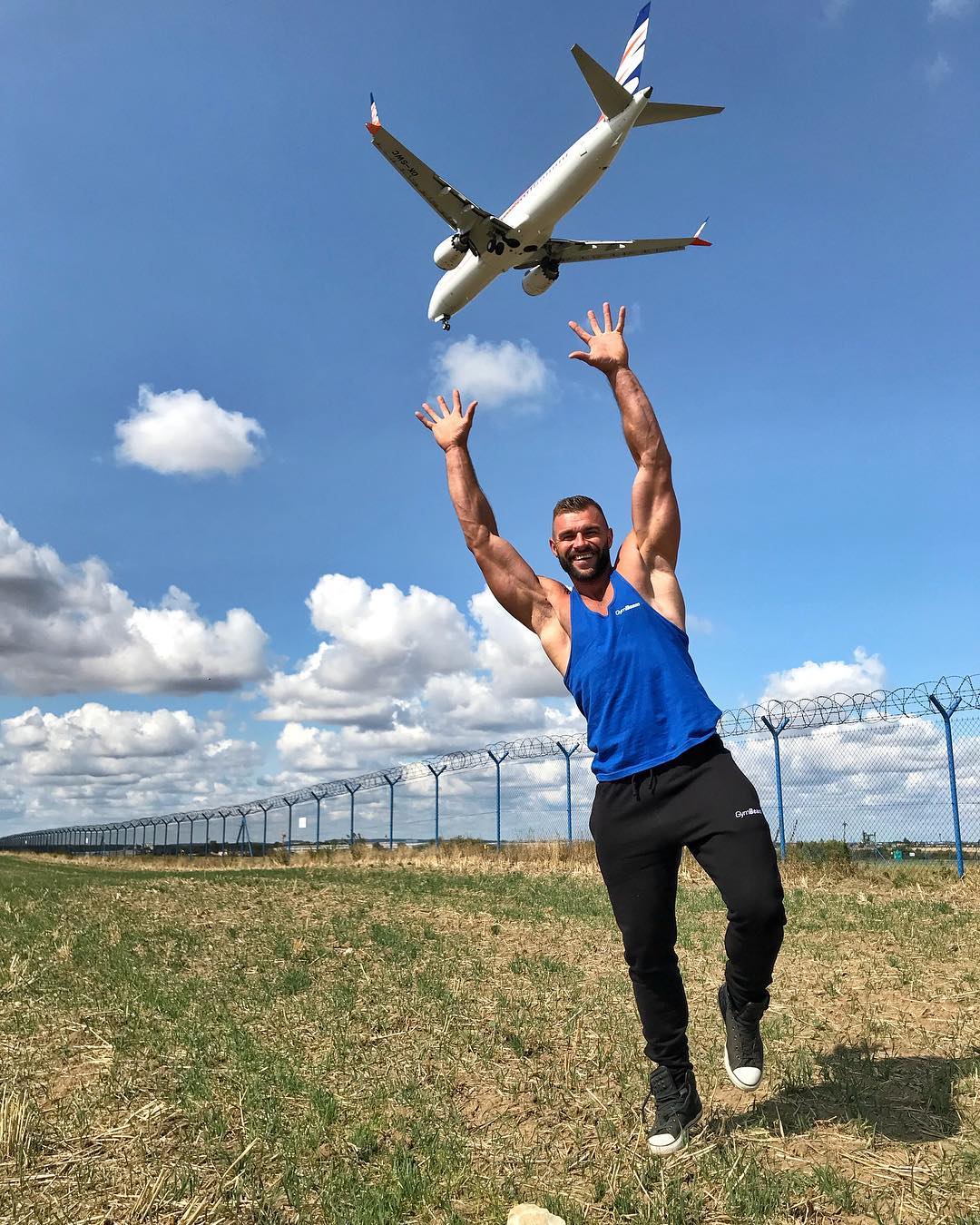 handsome-man-posing-plane-daddy