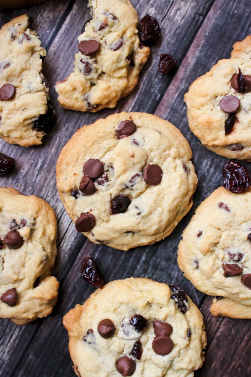 Cherry Chocolate Chip Cookies on a rustic wood background.