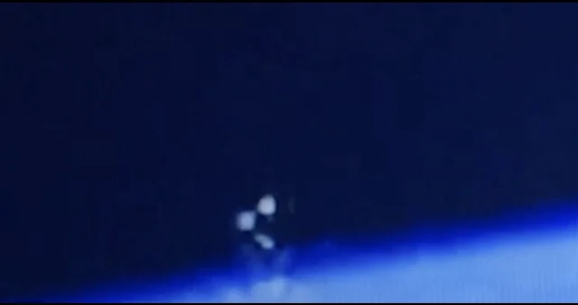 A closer look at the UFOs watching the ISS.