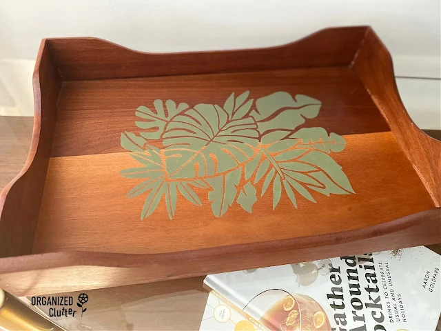 Photo of a stenciled and upcycled vintage mid century modern/boho desk tray.
