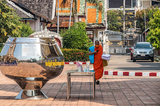A monk checks his phone, Chiang Mai