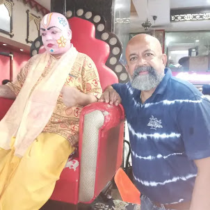 A photo shoot with " Maharaj(Brahmin Cook)" the Chotiwala Restaurant  greeter.