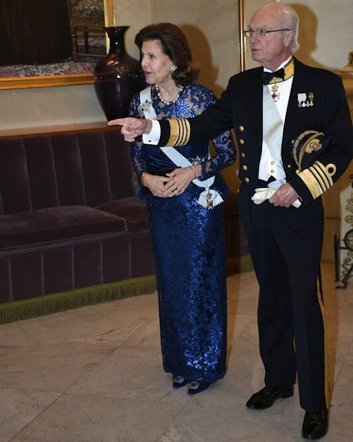 Queen Silvia attended the 250th anniversary event of The Royal Society of Naval Sciences at Grand Hotel. Royal blue lace gown