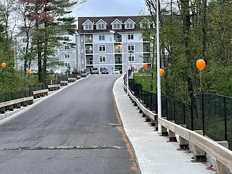 Road lined with balloons leading to the clubhouse at The Sto