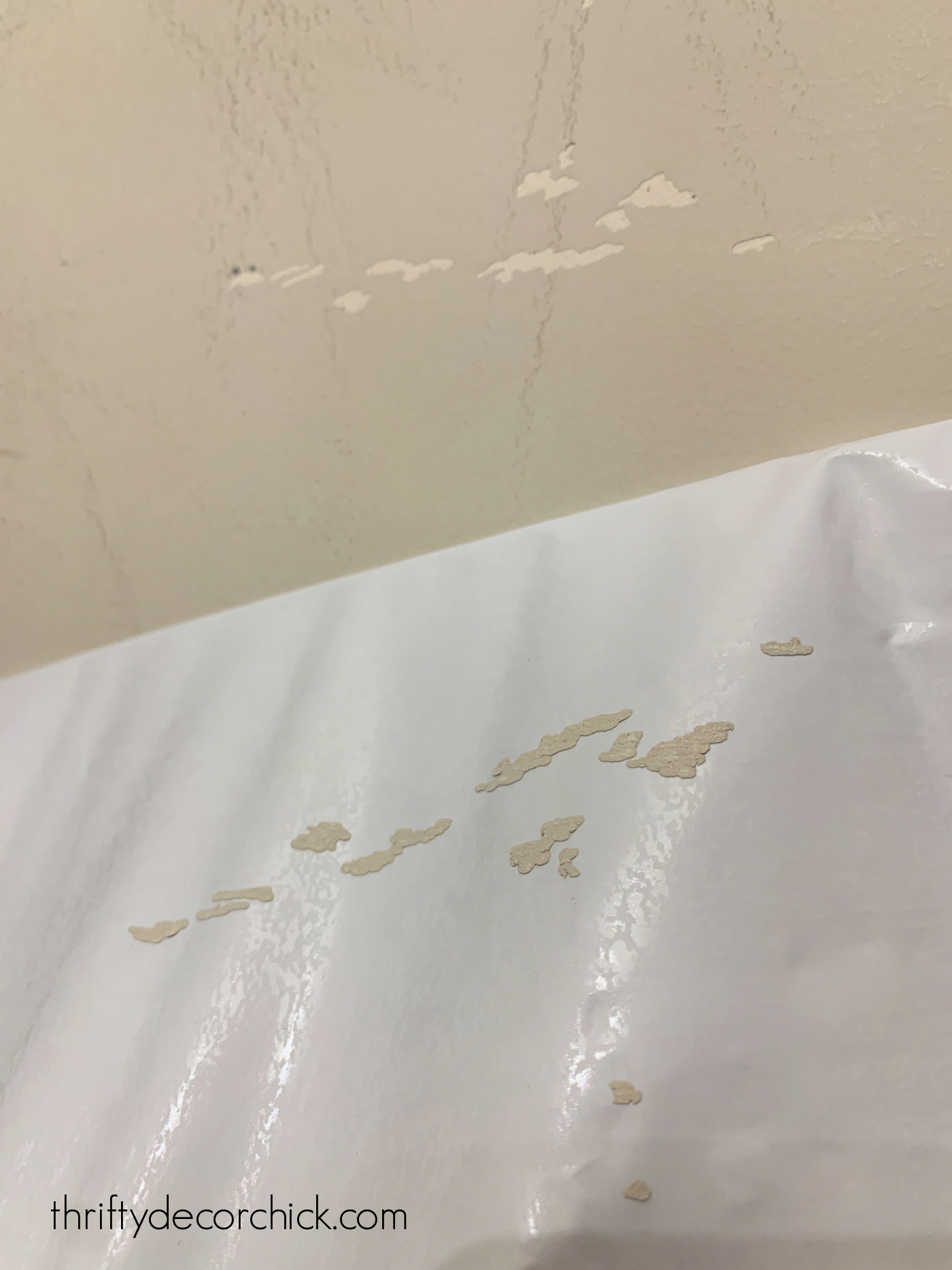 Drywall damage sticky wallpaper