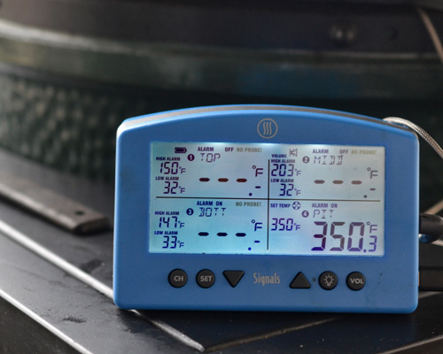 I used my Thermoworks Signals with a Billows fan to control the grill temperature. The Signals monitors the cooking temperature inside the grill, and when needed, it kicks on the Billows fan to stoke the fire.